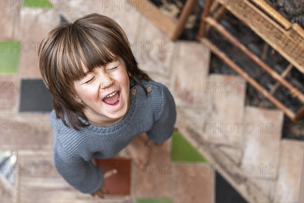 Little boy outdoors smiling