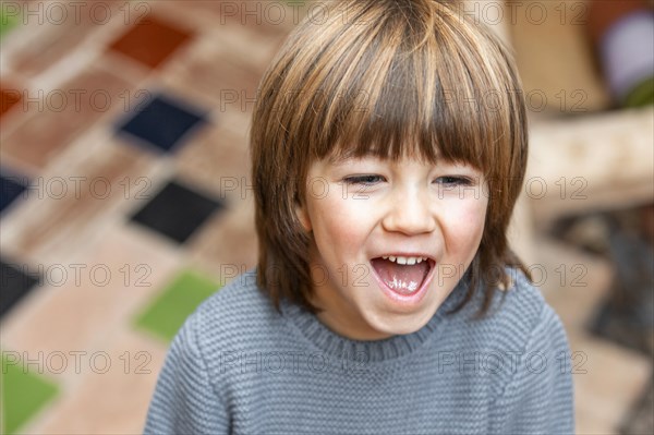 Little boy outdoors smiling 3