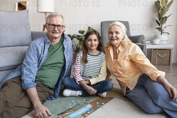 Medium shot grandparents kid 2