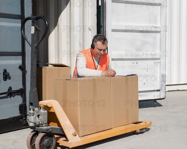 Medium shot man writing box