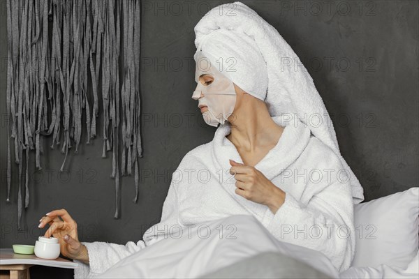 Medium shot woman bed