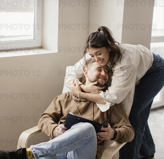 Medium shot woman holding man