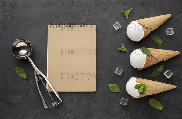 Notebook with ice cream cones with ice cubes