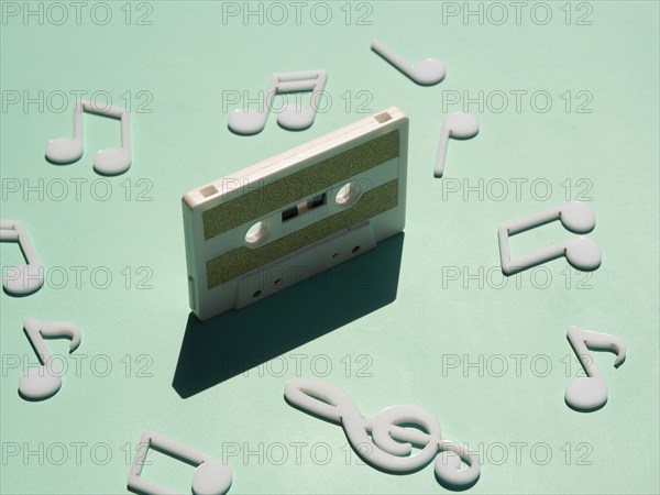 Old white cassette light with shadow