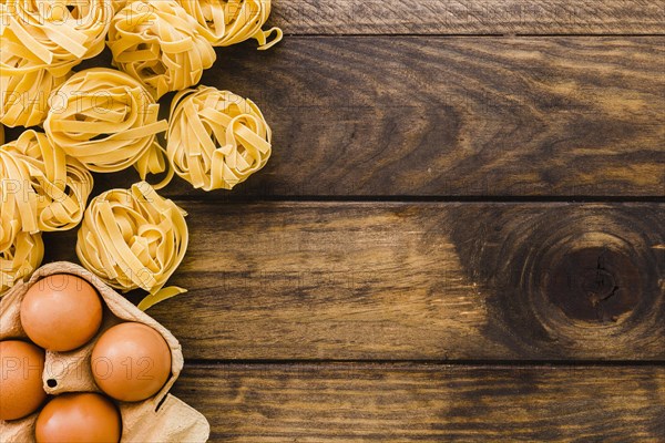 Pasta near egg carton