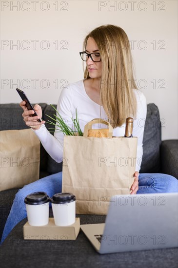 Portrait beautiful woman holding paper bag