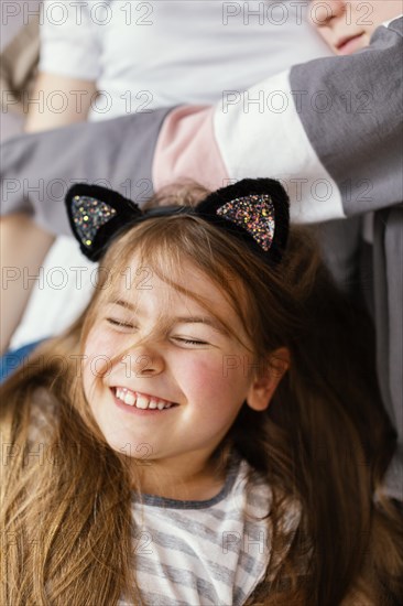 Portrait smiley girl home