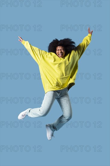 Portrait young female jumping 6