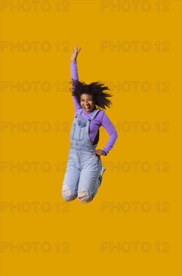 Portrait young woman jumping 6