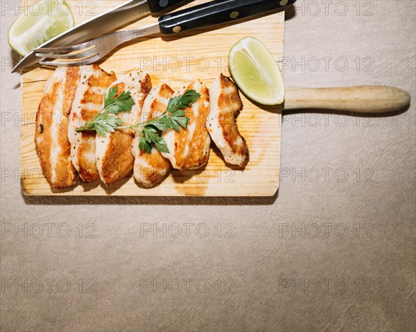 Roasted meat wit parsley lime
