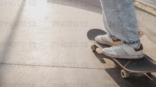 Side view teenager skatepark with copy space