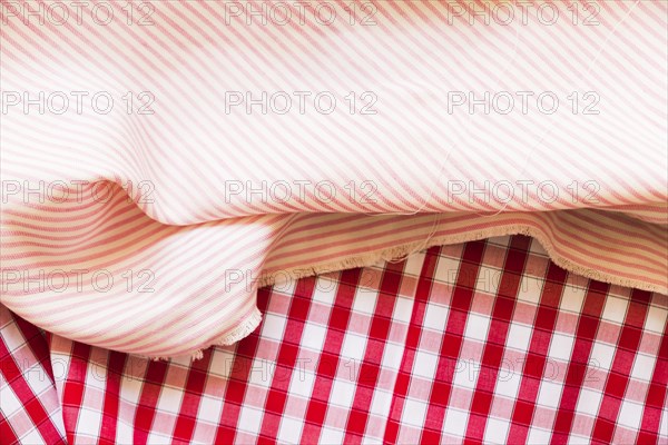 Striped folded fabric red gingham garments