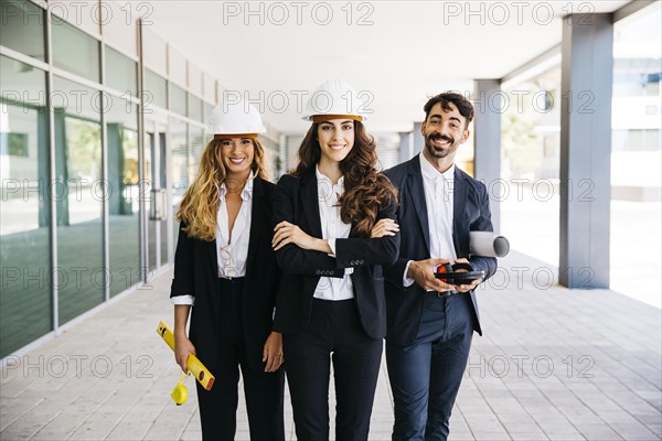 Teamwork concept with smiling architects