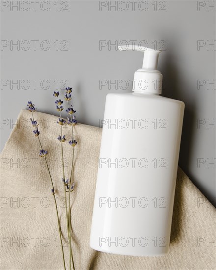 Top view arrangement with white soap bottle