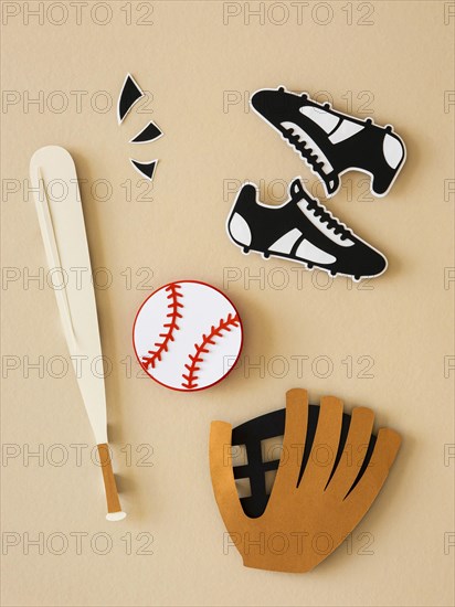 Top view baseball bat with sneakers glove