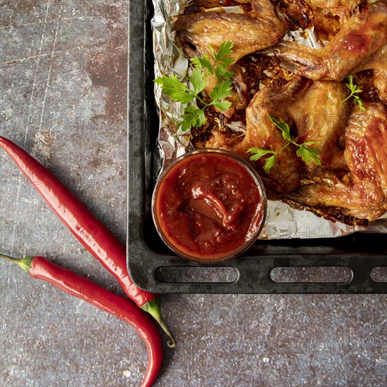 Top view hot chicken wings baking tray