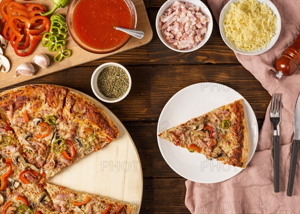 Top view pizza with red pepper slice plate