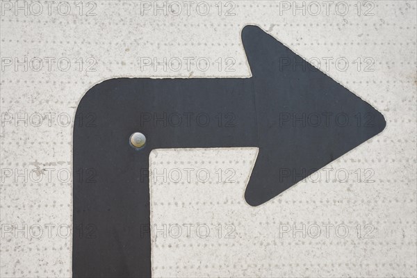 Traffic turn arrow sign thumbtack