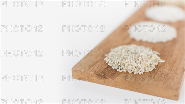 Variety rice wooden tray white background