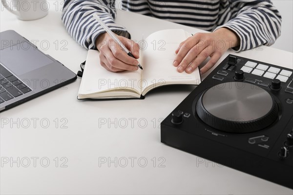 Woman with laptop working from home close up