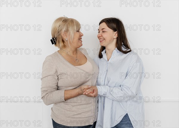 Women posing together medium shot