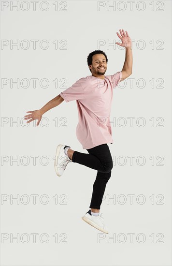 Young handsome man jumping 7