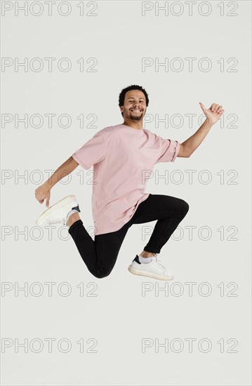 Young handsome man jumping 13