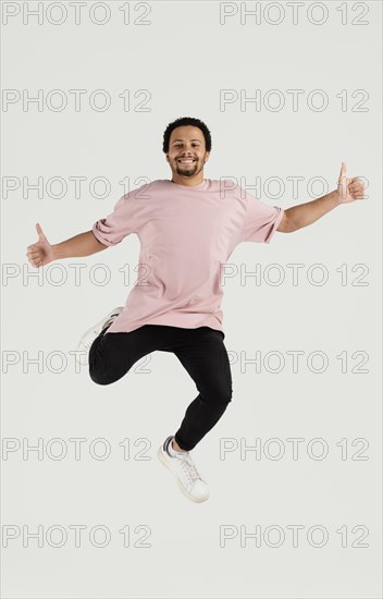 Young handsome man jumping 14
