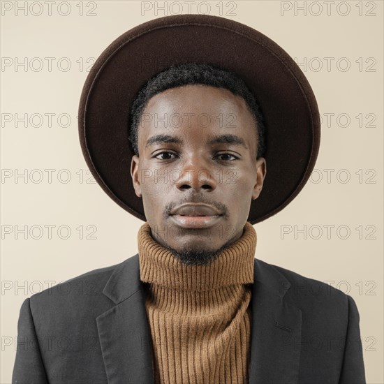 Young handsome man posing with hat 11