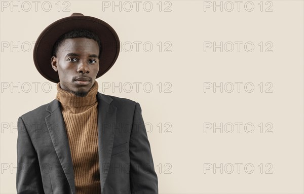 Young handsome man posing with hat 14