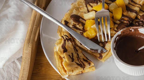 Arrangement with pancakes chocolate