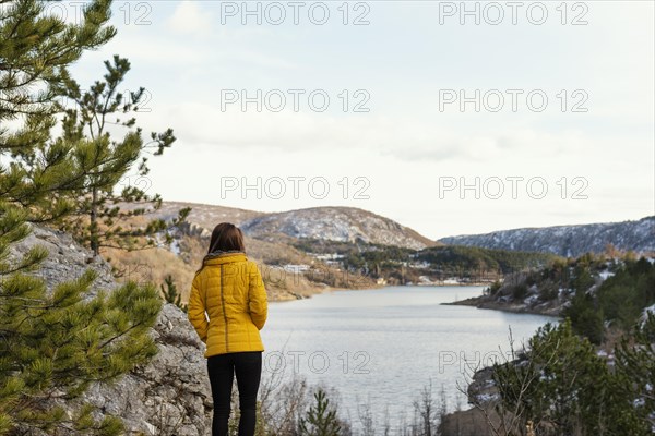 Back view young woman nature 3