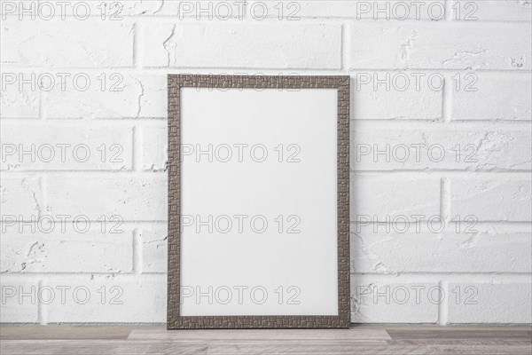 Blank frame shelf white wall