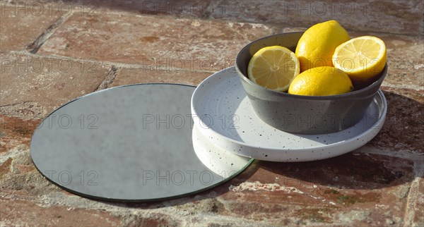 Bowl with fresh lemons