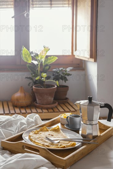 Breakfast bed with pancake high angle