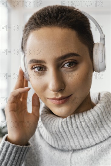 Close up beautiful woman with headphones