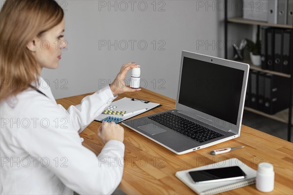 Close up doctor holding medicine