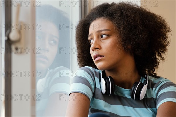 Close up girl with headphones quarantine