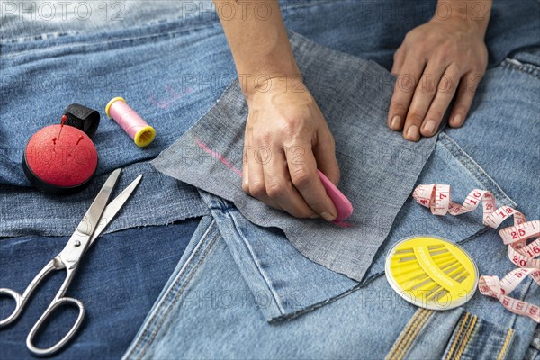 Close up hand drawing jeans piece