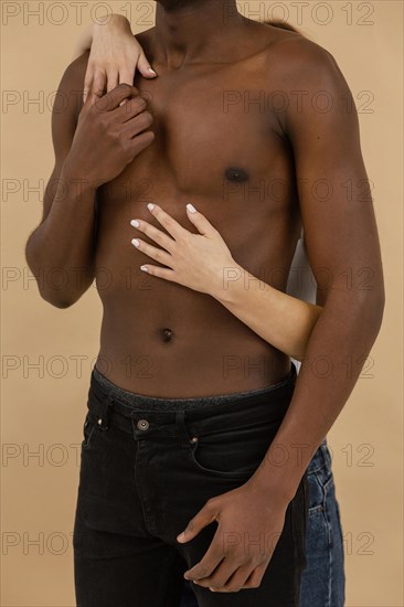 Close up hands holding black man