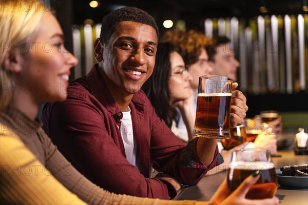 Close up happy friends with beer