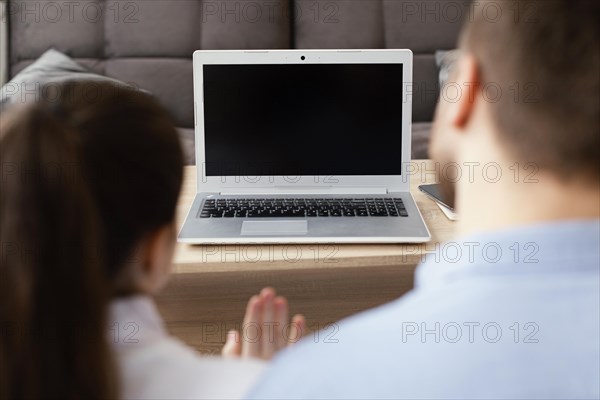 Close up man kid with laptop