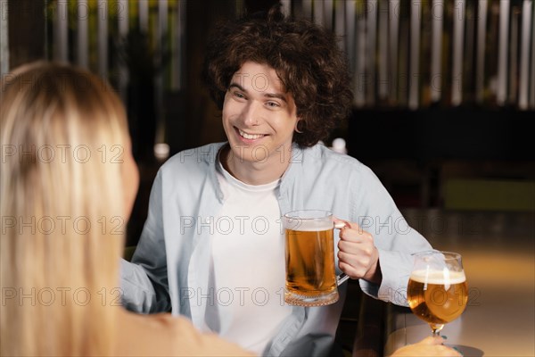 Close up smiley man woman pub