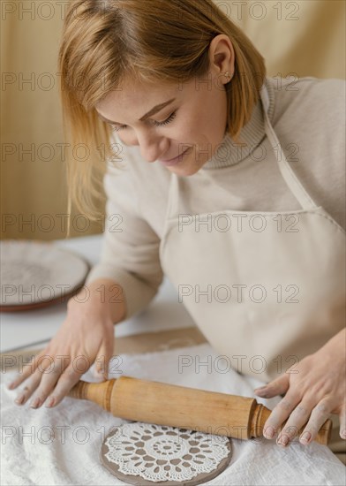 Close up smiley woman doing pottery 2