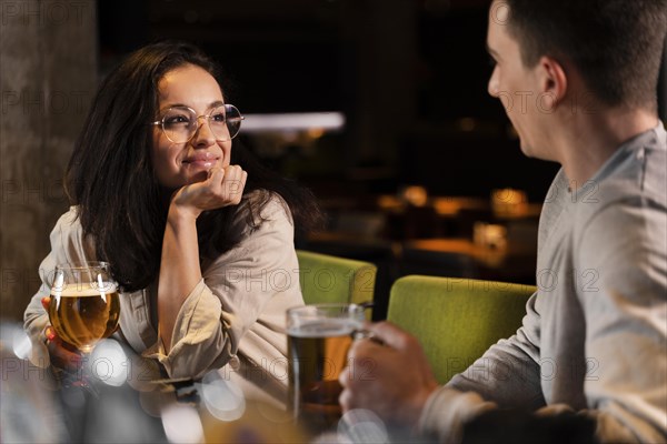 Close up smiley woman man with beer