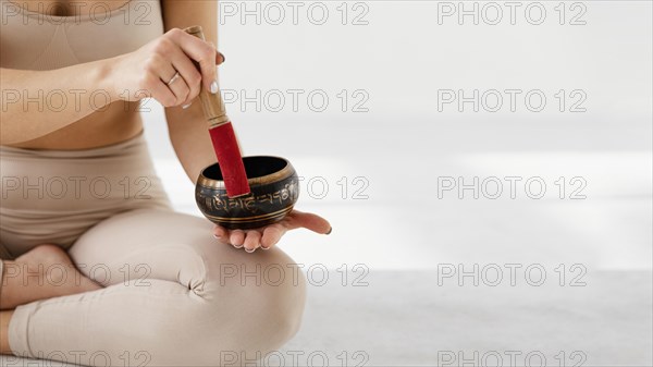 Close up woman holding bowl
