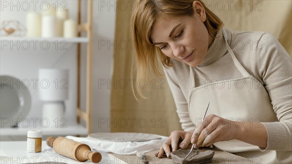 Close up woman making leaf