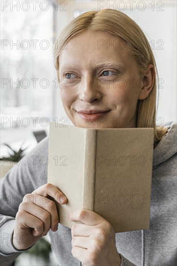 Close up woman with notebook