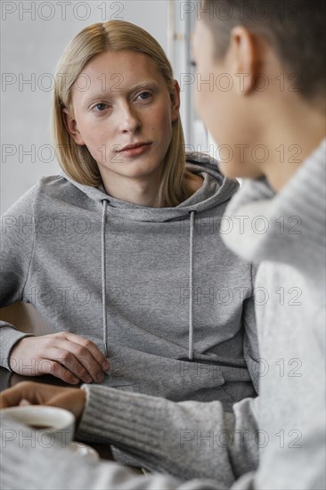 Close up women chatting