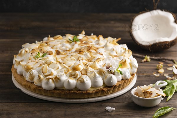 Delicious cake wooden table high angle